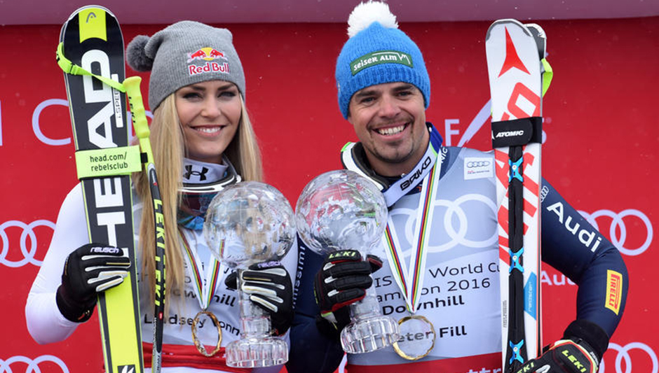 Lindsey Vonn (USA) and Peter Fill (ITA) after a downhill competition at the Alpine Ski World Cup Finals, in St. Moritz, Switzerland, Tuesday, March 15, 2016. (Pier Marco Tacca/Pentaphoto)
