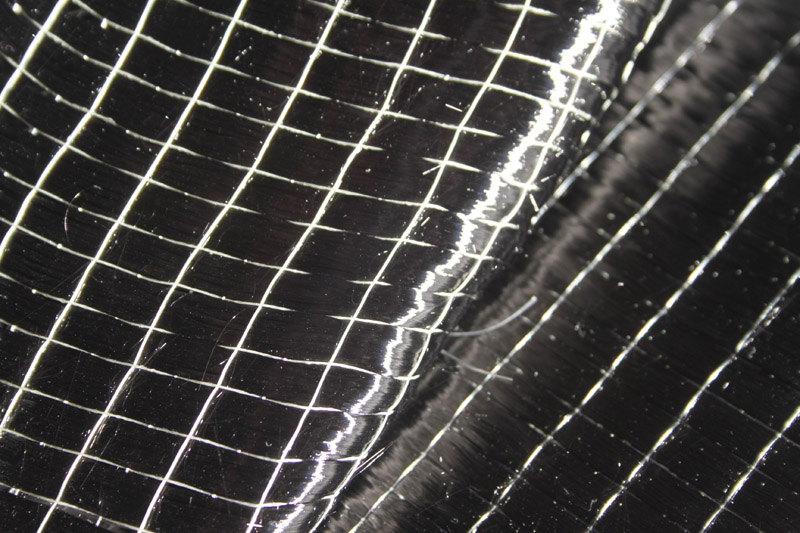 Tessuto di carbonio con filati termoplastici che si intersecano nella tramatura